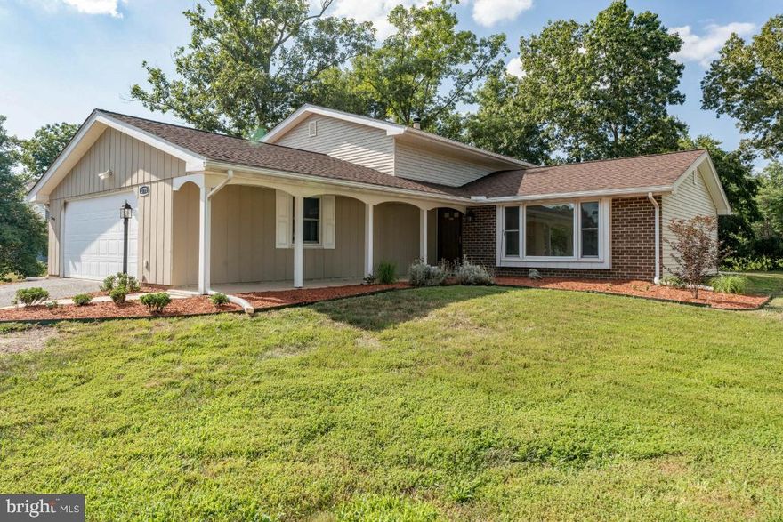 Professional photos coming soon!  This lovely 4 bedroom, 3 bath, 2 car garage home has new flooring and paint throughout and is completely move-in ready.  From entering into the foyer, you see the attention paid to details in the neutral colors throughout the home.  It's bright and fresh.  The living room has a wonderful picture window that allows natural light throughout the main level.  The dining room and living room have brand new LVP.   Ample storage and counter space in the kitchen that opens onto the back patio for outdoor dining or grilling.  Upstairs is the primary bedroom with ensuite full bath and two large closets.  Two more bedrooms and a hall full bath are also on this level.  The lower level has a large family room with a woodburning stove and new LVP flooring.  There is a sliding door from the family room to a second patio.  The lower level is also where bedroom four is located with an ensuite full bath that also opens into the hall for guests.  No HOA.  Commuting distance to DC, Pentagon, JBA, Anacostia, Boling, PAX, Indian Head, and MGM.  Commuter lot nearby.  Close to Shopping, Dining, Parks and Entertainment.