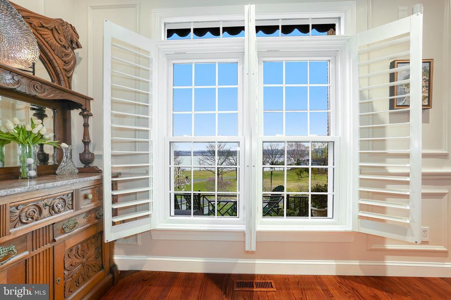 OPEN 3/28, 1-3PM!  Welcome to 809 Rivergate place in Charming Old Town, Alexandria!  This completely renovated Snowden Model -- down to studs -- is one of four units with stellar River views and is the only home in Rivergate with extensive interior redesign from builder's original floorplan to achieve living space optimization.   The list price of this unique townhome is higher than recent sales prices of other unchanged Snowden models, reflecting over $400K in remodeling costs.

Rarely available, this spectacular 4-Level, 3-Bedroom + Bonus Room, 3.5-Bath luxury townhome, located in a private Old Town Waterfront community, is one of only four residences with similar square footage that has unobstructed waterfront views!  

The property underwent an extensive custom renovation (down to the studs) in 2004, which included a detailed architectural redesign of virtually every room in the property.  All electrical and plumbing systems were completely revamped.  Dry wall was replaced and filled with double sound resistant insulation. The project created a dramatic main-level living space with 9-foot ceilings, which boasts a modern open floorplan, an expansive living room, an open-style luxury kitchen with a custom-designed island, and an elegant formal dining room with the capacity to seat private large parties.  From any of these vantage points, stunning river views can be observed through a river-facing wall of Georgian Palladian Windows.  An attractive rear brick patio, is accessible from the kitchen for grilling and outside activities.  ALL IS PERFECT FOR EVERYDAY LIVING AND ENTERTAINING!  

In addition, replacement hardwood floors grace each level of the property.  The spectacular primary bedroom suite was tastefully updated; and boasts vaulted ceilings, a separate sitting space, and walls of windows and river views.  Two remaining upper-level bedrooms (bedrooms #2 & #3) were reconfigured; the bonus room on the lower-level was also completely redesigned.  The lower-level bonus has an adjoining bath, and is large enough that this space could also be used as a recreation room if desired.  All interior marble baths have been renovated.  All exterior doors and windows were replaced in 2017. The roof was replaced in 2016.  A Sunair auto-retractable patio awning was installed in 2017.  The new garage door was installed 2018.  Interior recessed lighting was added in 2017.  A property sound system was also installed.  The wireless security system was first updated in 2017, and then upgraded again to 5G technology in 2021.  

The attention to detail given to the residence is truly amazing.  Fabulously located - parks, walking paths, restaurants, stores, and more - only steps away.  The property is exceptional, unlike any other luxury residence which has come to market on the Old Town Waterfront.