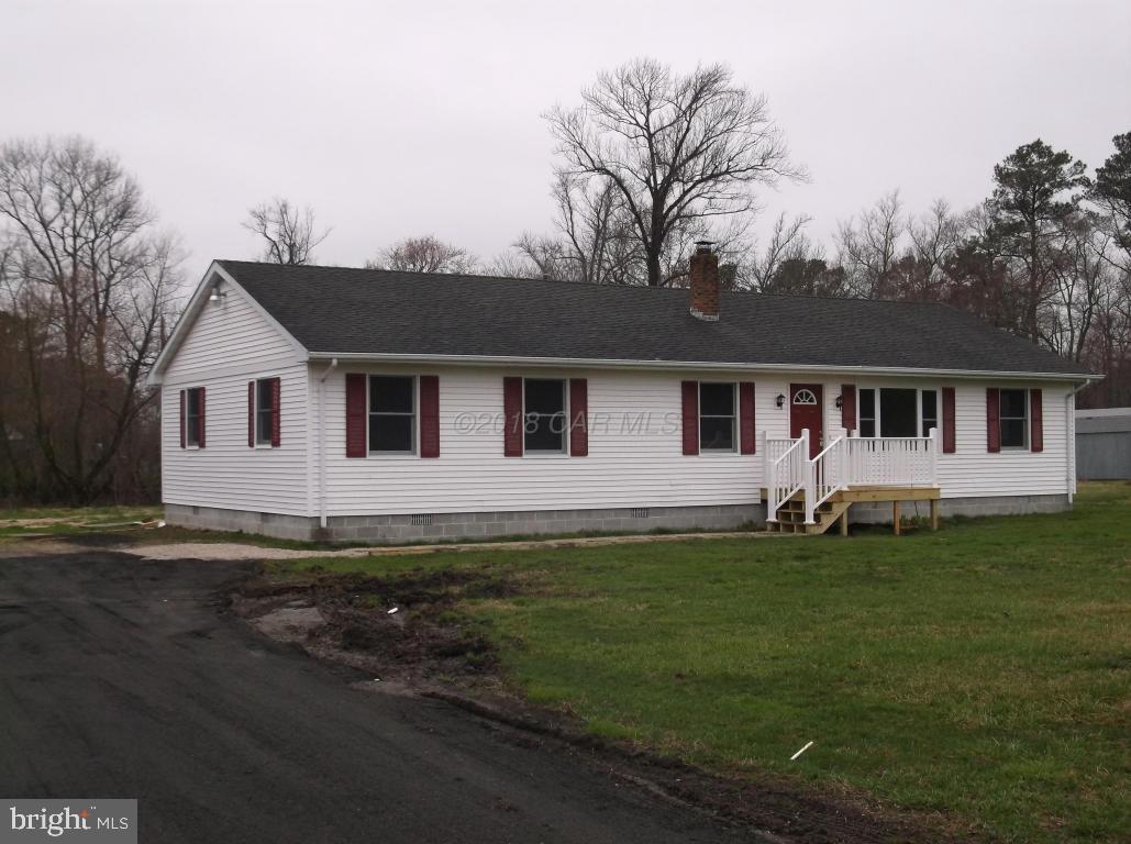 Nicely Remodeled! New Carrier Heat Pump, granite counters, kitchen cabinets, all appliances, includes washer & dryer. All new doors, bathrooms, windows, deck, lights & flooring. Bedrooms 2 & 3, each are connected to another room. This 4 bedroom house can easily be 5 or 6! Seller will make the necessary changes with acceptable offer. Mostly cleared almost 4 acre lot. Floors are laminate & carpet. Septic inspected & passed.