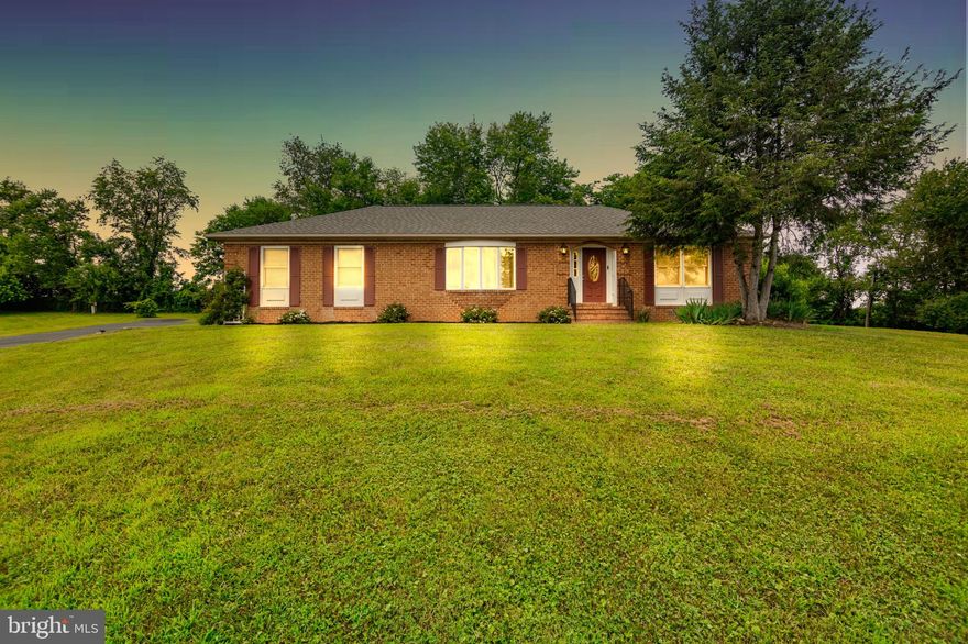Nestled at the end of a peaceful cul‑de‑sac in Cloverdale Heights, this rejuvenated ranch offers 1,920 sq ft of comfortable, single-level living on a lush 1.31‑acre lot. The home boasts a new roof installed in 2024, driveway resurfaced and new walkway added in 2025, and new flooring in 2025, all creating a fresh, modern foundation. Inside, the HVAC system was replaced in 2023, ensuring efficient comfort year-round, complemented by new light fixtures from 2023 that brighten and update every room. The kitchen shines with all-new stainless appliances (2023), perfectly matched by a new washer and dryer set installed in 2023, while a whole-house water filter (2023), new hot water heater (2024) and new water pressure tank (2024) enhance everyday ease and quality of life.

The skylit kitchen flows into a welcoming dining area and a refreshed back deck, ideal for gatherings. The spacious living room, with its bay window framing mountain views, offers a serene retreat. A smart split-bedroom layout ensures privacy for the primary suite, while two additional bedrooms share a hall bath. An oversized two-car side-entry garage with workshop space caters to hobbyists and project lovers. With thoughtful upgrades underfoot, overhead, and behind the scenes, this ranch is truly move-in ready—combining durable, modern updates with cozy, countryside living in a quiet cul-de-sac just minutes from US‑340 and WV‑9.