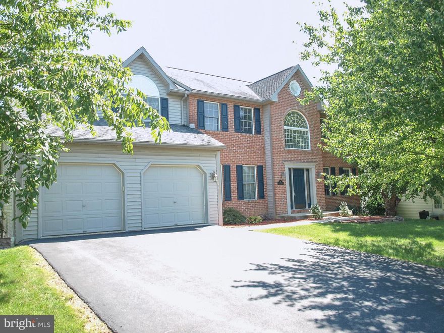 You'll feel at home when you enter this spacious 4 bedroom, 3.5 bath 2 story which boasts over 3,200 sq ft of living space, plus a huge finished walkout basement with kitchenette, full bathroom, 5th bedroom or den, and loads of storage area that opens into the rear yard. The open floor plan has a formal living room, dining room with picture frame molding, and first floor office. Large kitchen with center island, pantry, and breakfast area that opens to a deck overlooking the yard. The fam room is open to the kitchen, and features vaulted ceiling, skylights, and gas fireplace. The upstairs has a loft area overlooking the fam room and includes 4 spacious bedrooms. A double door entry leads to a master suite with vaulted ceiling, large master bath with skylight, soaking tub, separate shower, and large walk in closet. Great Wilson Schools, and a fabulous location, Green Valley Estates, with playground.