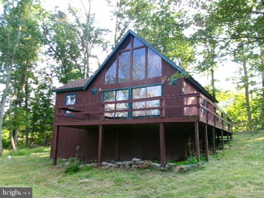 Call now to see this A frame cabin sitting on 4 acres with 2 bedrooms and1 bath. The property is being sold AS IS .