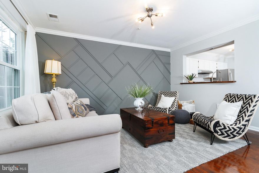 OFFERING $5K toward buyer's closing costs on a truly breathtaking home!  Beautifully renovated townhouse features an open, light-filled floor plan, professionally-designed interior by Yolo Homes, and stylish exterior. Chic upgrades await in this spacious home, such as custom-designed living room feature wall, freshly refinished wood floors, new countertops, live-edge wood bar, gorgeous high-end stainless appliances by Dacor & LG, new HVAC + hot water heater, and fresh paint throughout. Huge, master suite privately located on top level with walk-in closet and bath. Prime opportunity to own in the exclusive Manchester Farm community! Walk next door to Manchester's exclusive, members-only pool (Moco's largest private pool!), with gently sloping fields and wonderful playground. Fabulous location with friendly neighbors only minutes from food, entertainment, shopping, parks, freeways, and the area's best schools. Your new life awaits.