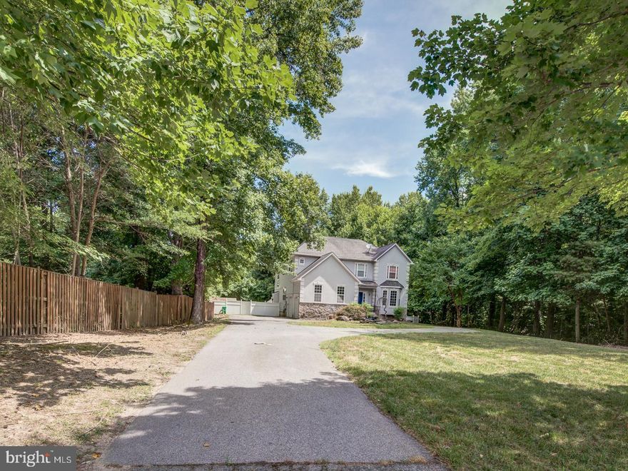 . Seller has received multiple offers. Please submit highest and best offers ASAP. Welcome to this estate home privately nestled on 0.78 acres in Upper Marlboro! Enjoy 3,368 sq ft of finished living space that includes 4 spacious bedrooms and 3 full and 1 half baths. The family room features a magnificent stone wall, cathedral ceilings, and ample natural light, creating the perfect environment for relaxing with loved ones. On the upper level, you will find the primary bedroom suite with a private en-suite bathroom, as well as three more spacious bedrooms and a full bathroom. The fully finished lower level provides a large space that is ideal for a family room or rec room and includes an 8-seat theater room! This home is conveniently located a short distance from shopping, restaurants, and gas stations. It is just a mile away from Marlton Golf Club and 5 miles to Brandywine for great shopping. Additionally, it is close to Routes 301, 50, and 97.