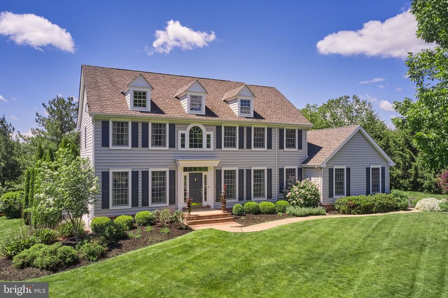 This home has it all! Nestled in the highly sought-after Fox Hunt Estates, and set on nearly 1.4 beautifully landscaped acres, this classic Colonial offers the perfect blend of timeless elegance and modern luxury—ideal for both everyday living and exceptional entertaining.

Step inside to a graceful first floor featuring Brazilian cherry hardwood floors, decorative crown moulding, and wainscoting throughout. The white gourmet kitchen is a dream, equipped with Sub-Zero and Wolf appliances, Carrara marble countertops, and a layout that flows into the sunny, casual dining area overlooking the beautiful backyard. A formal dining room, formal living room, den with fireplace, home office, mudroom and powder room complete the first floor.

Upstairs, the primary suite impresses with a tray ceiling, dressing room and a luxurious bath complete with soaking tub, and ample closet space. The additional three bedrooms are generously sized and perfect for family or guests.

The finished basement expands your living space, complete with a full bath featuring heated floors—ideal for a guest suite, gym, or media room.

The best part may be the backyard, which features not only a covered, lighted deck and patio, but also a sparkling in-ground saltwater pool and spa.  Sipping your morning coffee or winding down in the evening on the covered patio feels like relaxing in your own private nature preserve—surrounded by birdsong and peaceful stillness.   The lush, mature trees and landscaping offer shade, beauty and privacy.

Car enthusiasts will appreciate the three-car garage outfitted with Swisstrax flooring, two EV charging outlets, a heater, gladiator tracks organization and ample storage.

This home truly has it all and is move-in ready!  See the list of Special Features for more.