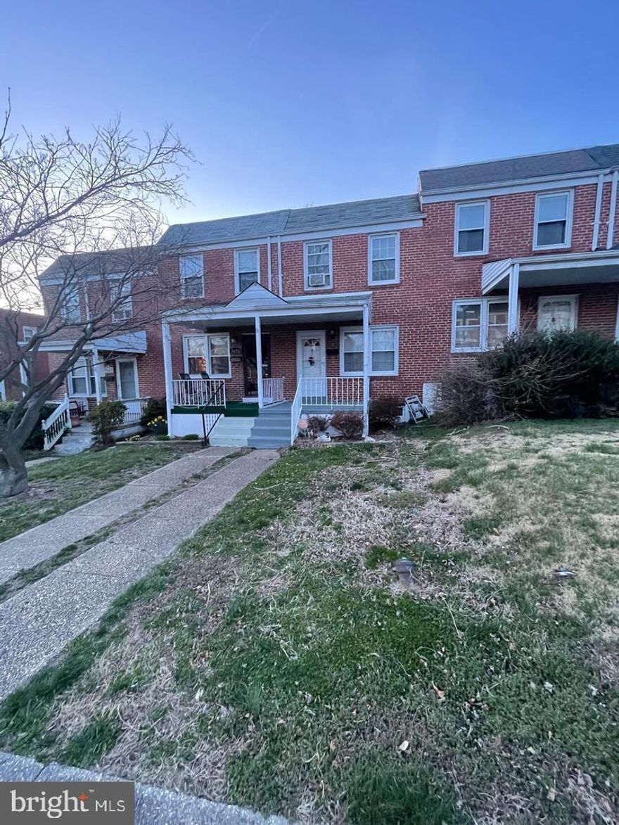 Beautifully maintained 2-bedroom, 1.5-bath townhome in Baltimore City's charming Violetville community. This inviting interior unit boasts a spacious, open floor plan with modern upgrades and a warm, cozy vibe. Available furnished or unfurnished, situated in a prime location. Currently rented by a stable tenant at $1,600/month since 2022 with an option for the tenant to renew for an additional year ending August 2026. The seller guarantees the rent, ensuring immediate cash flow from day one.