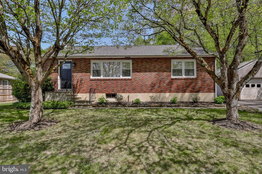 Located on a peaceful street with no thru traffic, this meticulously maintained brick ranch is full of character and move-in ready. Hardwood floors run throughout the home, adding warmth and timeless appeal. The layout offers comfortable living with bright, spacious rooms. The kitchen features granite countertops and custom cabinetry, and it flows seamlessly into the open-concept dining room. The recently updated bathroom adds a stylish, fresh touch. Enjoy outdoor living in the large backyard—bordered by trees on the right-hand side—perfect for relaxing, entertaining, or gardening. The oversized detached garage provides abundant space for parking, storage, or even a workshop. Plus, recently replaced roofs on both the house and garage offer added peace of mind. Book your tour today!