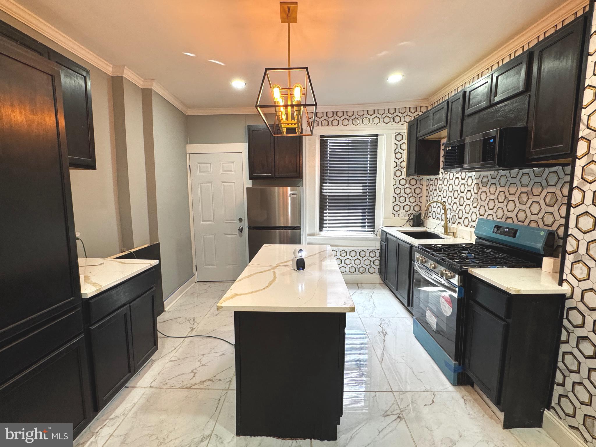 Completely Renovated 3BR/1BA Rowhome in Baltimore City!
Welcome to 2525 W Lombard St – This fully renovated home features 3 spacious bedrooms, 1 updated full bathroom, and a finished basement. Enjoy a brand-new roof, modern flooring, fresh paint, and an updated kitchen with contemporary finishes. The finished basement adds flexible living space for a rec room, office, or guest area. Conveniently located near commuter routes, downtown Baltimore, and local amenities. Perfect for owner-occupants or investors seeking a move-in-ready property. Schedule your tour today!