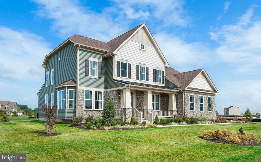 The Kennedy Model Home by Blenheim Homes, located at 1203 N. Olmsted Parkway in the prestigious Bayberry North community, offers a masterclass in modern luxury and functional design. This expansive residence boasts 5 bedrooms and 5.5 bathrooms, including a convenient main-level in-law suite and a spacious 3-car garage. The home greets visitors with a grand two-story foyer and an elegant butterfly staircase that leads to an open-concept main level featuring a gourmet chef’s kitchen and a soaring two-story family room. The living space extends into a fully finished basement designed for entertaining, complete with durable tile flooring and 6' sliding glass egress doors that provide ample natural light and easy outdoor access. Situated within the award-winning Appoquinimink School District, this home is surrounded by Bayberry’s premier amenities, including a 70-acre park and an 11-acre lake. Please note that all viewings of this model home are by appointment only; interested parties must call the sales center to schedule a visit.