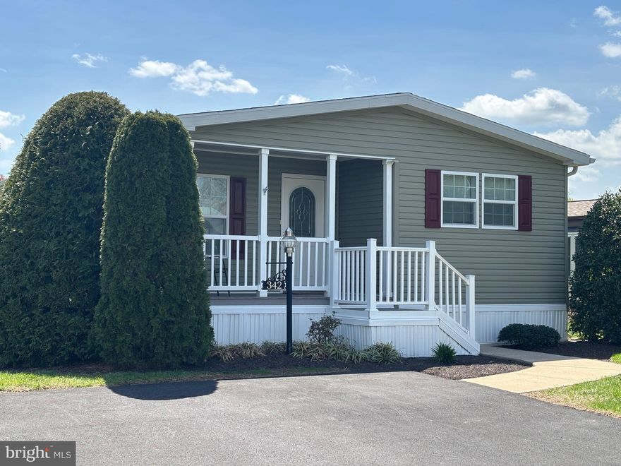 Welcome to this meticulously maintained 2014 home featuring 2 bedrooms, 2 bathrooms, and a den, at the 55+ Village of Neshaminy Falls. Enjoy convenient parking right in front of your home, with a short walk to a covered porch, perfect for sipping iced tea, reading your favorite novel, or chatting with neighbors.

Inside, you'll find a spacious, carpeted living room that opens to a fully equipped kitchen and dining area, with an overhead chandelier. The eat-in kitchen includes recessed lighting, a large island with pendant lights, ample counter space, and all the major appliances needed to prepare your favorite dishes.  

Down the hallway, you can retreat to a comfortable den with French doors, ideal for quiet moments or catching up on the news from your phone or TV. The laundry room is equipped with a newer washer and dryer, and an exit door leading to the outdoors. There is also a guest bedroom and bathroom conveniently located just off the hallway for visitors. The large primary bedroom offers plenty of closet storage and features an ensuite bathroom with a double sink, shower stall, and commode.  

Make your appointment soon.  This will go fast!