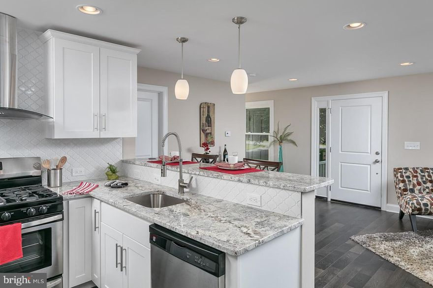 This charming 4 BR, 3.5 BA home will be sure to dazzel you! Be greeted by shining HWs in LR & sunny DR. SS appls & granite in kit w/bkfst bar. Open layout is ideal for entertaining! MSTR w/en-suite BA invites you to relax & soak in whirlpool tub. FF LL grants tons of extra space for FR. Huge back deck & sweeping yard inspire time in nature. Invite the neighbors for a BBQ! Plus multi-car driveway.