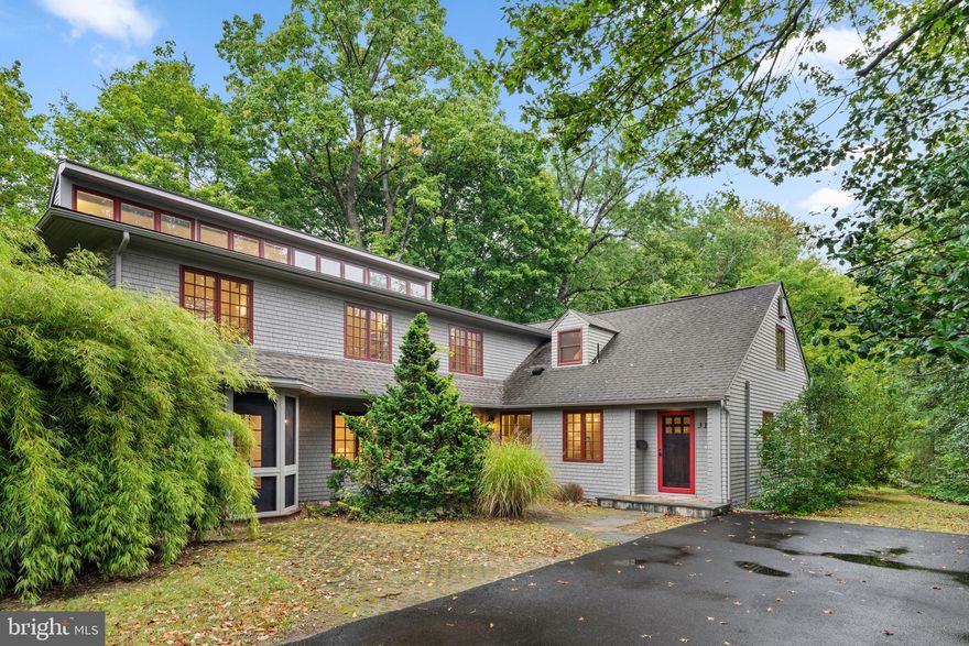 Just featured in the Philadelphia Inquirer! Located in the highly sought-after A + rated Wallingford-Swarthmore school district. This beautifully updated and renovated Contemporary/Mid-Century-Modern home sits on a very desirable block in the always-in-demand Swarthmore Borough neighborhood—where homes like this rarely come to market. Featuring 5 bedrooms, 4 full bathrooms, 6 car driveway, a home office, den, separate family and living rooms, Yoga/Pilates/Peloton/Fitness room, 2 indoor and outdoor stone fireplaces, multiple screened porches, a rear deck, first floor: in-law/nanny/au-pair bedroom and full bathroom, kids/pets play/game room, laundry room with sink, cabinetry, counter and storage space and a finished basement with windows perfect for a workshop, home business, arts & crafts, additional storage and more. The huge primary bedroom boasts an en suite full bath, vaulted ceilings and walls of windows. Situated on a large private .82 acre fenced level lot, this property offers a rare combination of style, comfort, and lots of outdoor space. The home boasts a stunning private yard oasis—professionally landscaped and hardscaped—with native pollinator flowers, plants, shrubs, ornamental grasses and specimen trees. The outdoor space is enhanced by a custom Ipe wood rear deck and multiple Ipe wood screened porches, PA fieldstone walkways and garden walls. This expansive yard creates a truly rare outdoor retreat that feels like a private arboretum great for bird and wildlife watching, entertaining, kids, pets, playing, your next party, BBQ or special occasion. Inside, the layout is open and bright, with lots of windows, light, closets and storage. The cozy floor-to-ceiling fireplace with a stone surround and live edge wood mantle is a great focal point in the wide open living and dining rooms open to the kitchen and breakfast rooms. The home is filled with thoughtful updates, including an open cook’s kitchen with a breakfast bar and  breakfast room, Oakmoss solid wood cabinetry, Brushed Brass faucet, hardware and fixtures, solid surface countertops, tile backsplash, pantry, stainless appliances (cooktop range/oven, range hood, refrigerator/freezer, dishwasher, disposal), undermount sink, recessed lighting and Oak LVP flooring. The entire interior and exterior of the home has been updated. Additional upgrades and features include Andersen Low-E casement, double-hung and bay windows to bring the outside in, Andersen French and sliding glass doors to the screened porches and yard, restored wood entry doors, interior doors, architectural shingle roof, all baths, gutters, downspouts, 200 + amp electric (multiple panels), multiple zoned high-efficiency Carrier furnace and central air HVAC systems, multiple zoned high-efficiency Carrier and Mitsubishi cooling and heating mini-split systems, high-efficiency AO Smith hot water heater. The entire interior and exterior were just professionally painted. Original and new hardwood floors throughout the entire home. Other highlights, LED recessed, Brushed Brass and Matte Black lighting throughout, Matte Black exterior lighting, custom closet organization. The home is filled with natural light, generous storage, and abundant space to spread out both indoors and out. Enjoy walkability to CADES school and other top-rated schools, restaurants, coffee shops, cafes, boutiques, parks, trails, hospitals, and universities. This is truly a rare opportunity—a “needle in a haystack” in Swarthmore Borough. Minutes and easy access to Philadelphia International Airport, the Swarthmore SEPTA train station to Center City, Downtown Philadelphia, Swarthmore College, Scott Arboretum, Swarthmore Town Center, & the Farmers Market, 1, 476, 95, PA, DE, NJ, Brooklyn, NYC, Poconos, beaches, MD and DC. Easy access to Target, Whole Foods, Trader Joe’s, Home Depot, Lowe’s and more. The convenience is unmatched.