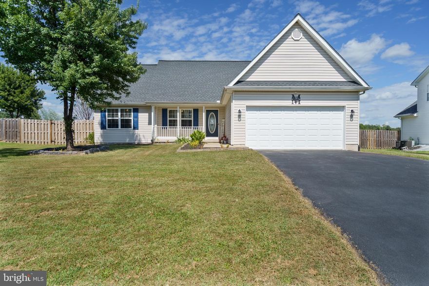 Charming 3-Bedroom 2 bath Rancher in South Martinsburg!
Welcome home to this beautifully maintained 3-bedroom, 2-bathroom rancher nestled on a level lot in a South Martinsburg neighborhood. Step inside to discover an inviting open floor plan featuring cathedral ceilings, a cozy gas fireplace, and a spacious living area perfect for entertaining.
The kitchen is a cook’s dream with stainless steel appliances, ample counter space, a pantry, and convenient access to a separate laundry room and a table ready dining area. The home offers a 2-car garage equipped with shelving and a workbench—ideal for DIY projects or extra storage.
Relax on the covered front porch or enjoy outdoor gatherings in the fenced-in backyard with a covered rear porch for year-round comfort and privacy. This home offers easy living on one level, combining comfort, style, and practicality.
Don’t miss out—schedule your private tour today!