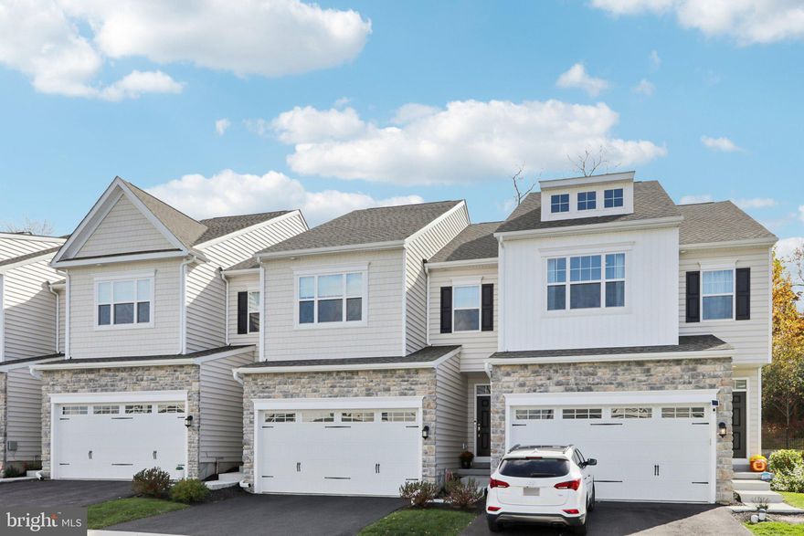 New outstanding price and excellent value for a home built in 2024! Brand new, barely lived in with $25,000 in custom and stylish upgrades! Come discover Sutton Grand at Willistown Point - this modern 3-bedroom, 2.5-bath newly constructed townhome offers just over 2000sq ft of beautifully designed living space in one West Chester's most sought after communities. Enjoy an open-concept layout perfect for entertaining and everyday living. The chef's kitchen with granite countertops, stainless steel appliances, sleek modern cabinetry and large island is the center piece of this sun-lit space! The warm, sun filled great room with luxury vinyl plank floors offers easy access to the back patio where you can soak in the sun and enjoy a beautiful wooded view.  Upstairs it's all about the details with Heringbone tile floors in the main bath and laundry room. Enjoy a spacious primary suite with walk-in-closet, custom vanity and walk-in shower. Two additional bedrooms offer ample closet space and designer finishes throughout.  This thoughtful home offers low-maintenance living in a walkable, scenic community. Nestled in the prestigious Willistown Township, minutes from downtown West Chester, major routes, and award winning schools!
