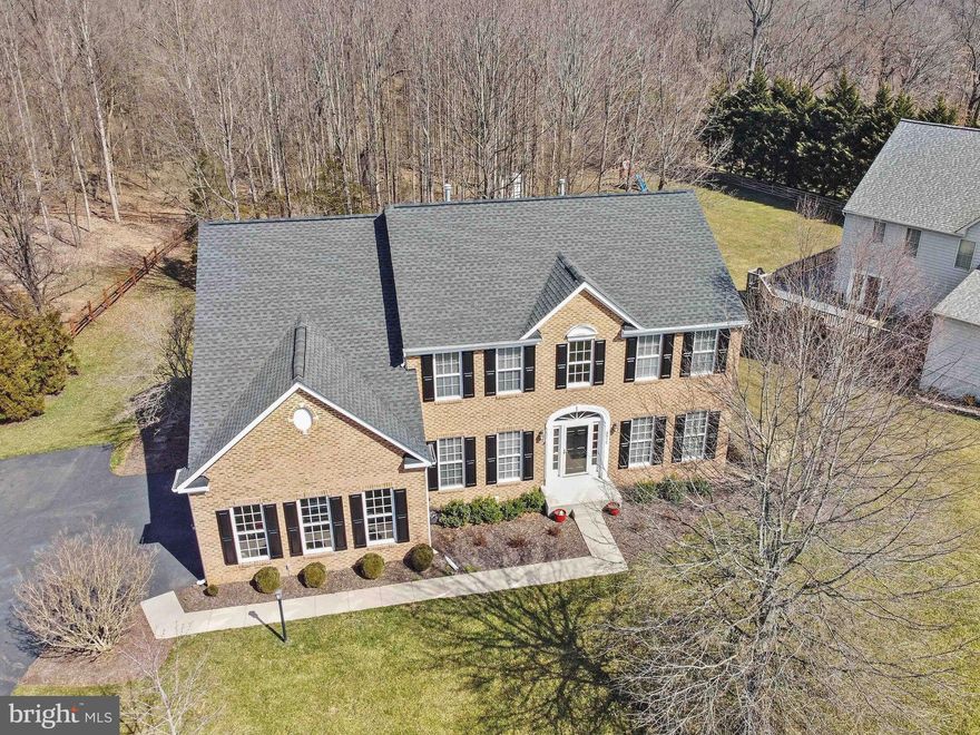 EXCEPTIONAL OPPORTUNITY!  Gainesville's COVETED Oak Valley! IMPRESSIVE 4BR/3.5 Bath Home.  DESIRABLE OPEN Floor Plan! Home situated on PRIVATE Cul-De-Sac on PREMIUM lot with LUSH Surroundings. Beautiful New Kitchen Granite, under cabinet lighting, Newer Stainless Steel Appliances with high-end appliances like Bosch and Jenn Air, with recently painted  Agreeable Grey Neutral pallet. EXPANSIVE Family Room with 4-foot bump-out wired for surround sound with stacked stone fireplace open to Kitchen with Large Island and Sunroom.  Private main level study, living room and formal dining room with beautiful new chandelier.  Upper Level Living Quarters includes Hardwood Floors, SPACIOUS Primary Bedroom with Sitting Room perfect 2nd Office, Walk-In Closet, and UPDATED Bath including Jacuzzi Tub, Separate Shower, Upgraded Tile, new Vanity, Lighting, and Mirrors.  3 Additional Bedrooms and Updated Full Bath.  Walk-Out Lower Level has nice OPEN MEDIA Room wired for 5.1 Surround Sound, Gaming/Recreation Space, and Built-In Desk perfect for virtual learning or hobbyist. The Multi-Tiered Maintenance Free Decks overlooks  your OUTDOOR OASIS backing to HOA Tree Preserve.  Entire home wired for audio.  Plenty of room to build the pool of your dreams.  Buyer Peace-of-Mine New Roof (2020) Maintenance Free Decks (2021), Upper Level HVAC (2013).   Oak Valley Offer's LOW HOA Fee's and NEARBY Shopping, Dining, and Major Transportation Routes. Jump on this one!!