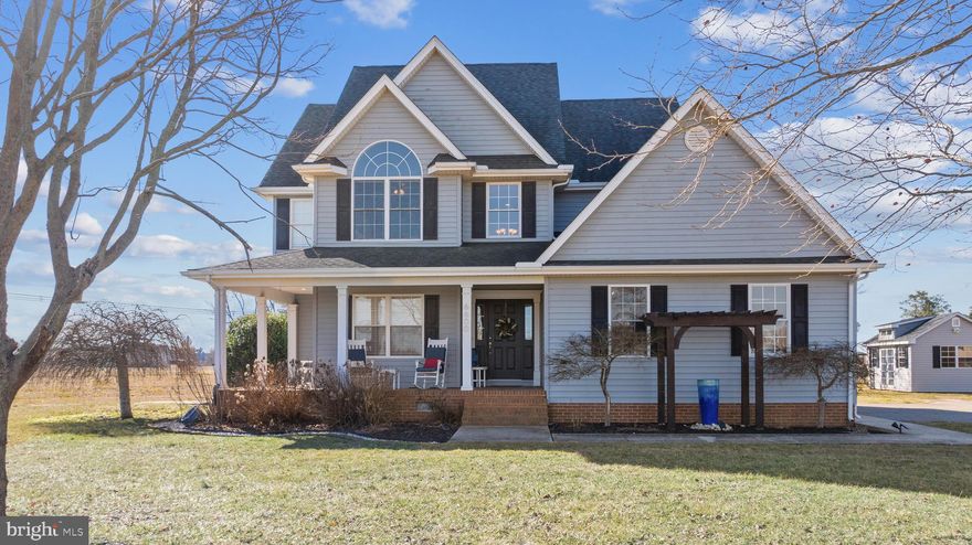 Welcome to a Somerset County gem. This home is conveniently located 10 minutes from Pocomoke City, 20 minutes from Crisfield and 30 minutes from Fruitland. You receive the perfect mix of country living while having the option to get to close by towns swiftly. Once you enter the Orchard Landing neighborhood and arrive at the residence, you will see a beautifully kept home placed on a 1.22 acre lot. As you pull up to the house and park in one of your two attached garage spaces, you'll enter a first floor that includes a half bath, beautiful staircase that overlooks the foyer, and a dining room or flex space.  Continuing through you will find an open kitchen and spacious living room area perfect for hosting. As you walk up the steps you will find two bedrooms that include walk-in closets and a full bathroom close by. The primary suite has a gracious sized walk-in closet, an en suite bathroom with a soaker tub, shower, and double vanity. The front porch or back deck are the perfect locations to enjoy your morning coffee. Call today to schedule a showing!