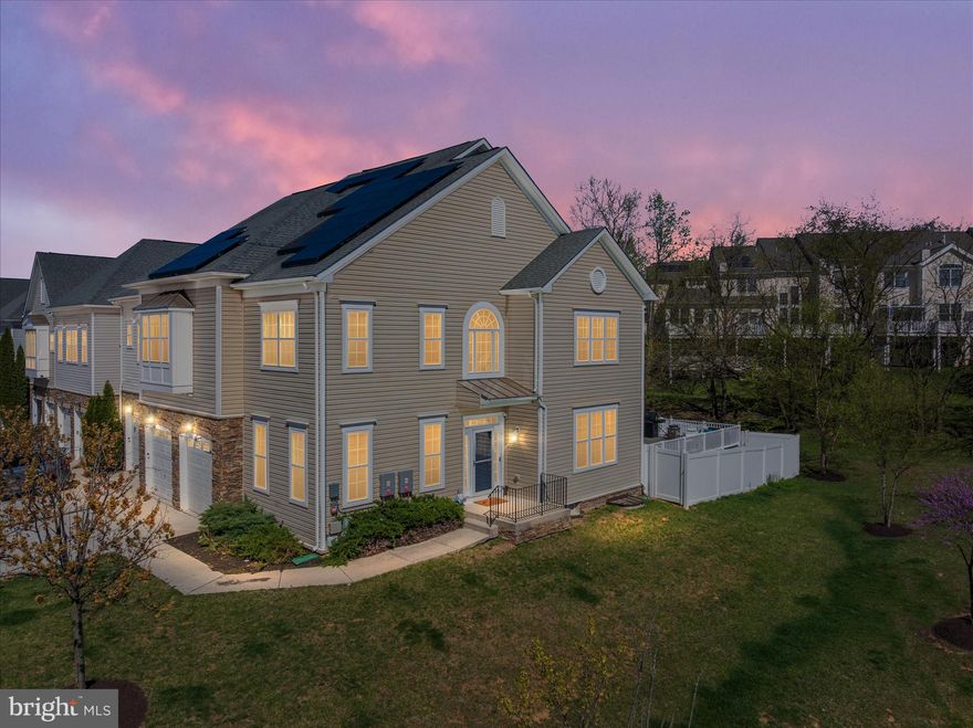 Welcome to the highly sought-after Stone Lake Community, a gated neighborhood with a 24/7 staffed security entrance and access to a beautiful private lake enjoyed year-round by residents.

This stunning End Unit Town house with 5-bedroom, 4.5-bath home offers spacious, thoughtfully designed living across three finished levels, enhanced by 10-foot ceilings throughout and an abundance of natural light that fills every room. The home has also been freshly painted throughout (2026), giving it a bright, modern feel. The upper level features four bedrooms, including a luxurious primary suite, while the finished basement includes a fifth bedroom with closet and egress window, perfect for guests or extended living.

The main level showcases updated 5” hickory hardwood floors, a bright and open layout, and a beautifully renovated kitchen. Enjoy white cabinetry, quartz countertops (2020), stylish backsplash (2020), and all-new stainless steel appliances (2026). The kitchen was thoughtfully opened by removing a wall, creating a seamless flow and adding a large center island with sink and seating—perfect for entertaining or casual dining—with additional space for a kitchen table.

Just off the kitchen, step down to a spacious pantry area that also provides convenient access to the garage and a main-level half bath. The family room with a cozy gas fireplace sits adjacent to the kitchen, creating the perfect gathering space.

Step outside to the low-maintenance deck, ideal for relaxing or entertaining, complete with a hot tub (2021), and enjoy the privacy of a vinyl-fenced backyard.

Upon entry, you’ll find a large, light-filled home office to the left and an elegant formal dining room to the right, featuring crown molding and chair rail detailing.

Upstairs, two bedrooms share a Jack-and-Jill bathroom, while another bedroom features its own private bath. The impressive primary suite boasts soaring ceilings, a spa-like en-suite bath, and an expansive walk-in closet that conveniently connects to the upstairs laundry room and hallway for easy access.

The fully finished basement offers a complete additional living space, including a bedroom, full bath, and flex area perfect for a gym, media room, or playroom.

This home combines comfort, style, and functionality in one of the area’s most desirable gated communities. Don’t miss your opportunity to enjoy lake living, privacy, and modern upgrades all in one exceptional property.