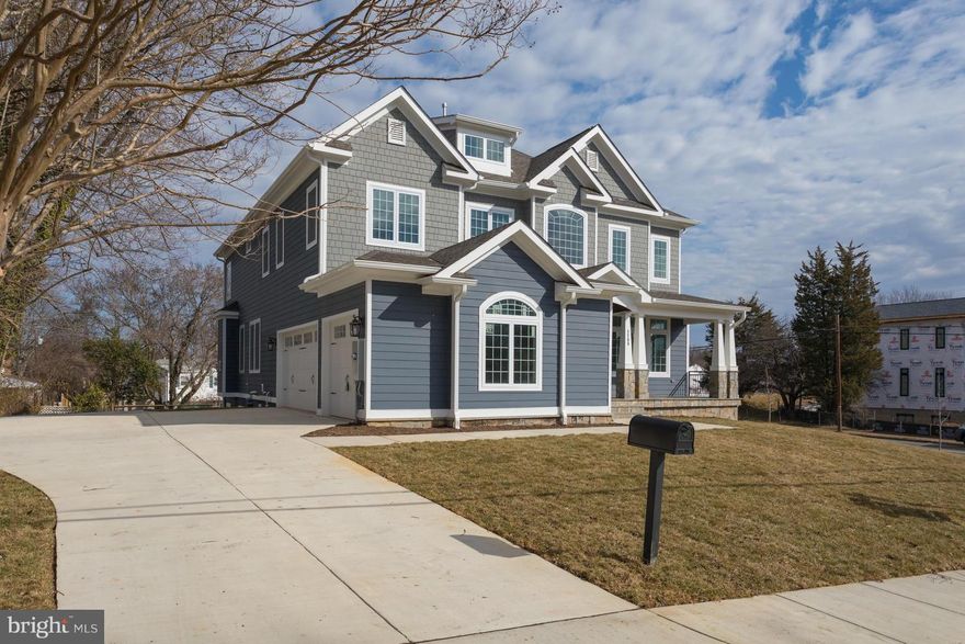 NEW CONSTRUCTION!  10 feet ceilings; 3-car side load garage; crown molding; coffered ceiling; chair rail; oak HW floors; large gourmet kitchen w/ stainless steel appliances; fully finished walk-out basement w/ wet bar, enormous master-suite w/ walk-in closet, large bath w/ marble floor, separate rain shower/multiple shower-heads, and soaking tub.  HW floors on 2 levels. Convienent location.