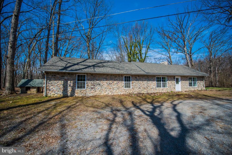 Price Adjustment Cozy 3 Bedroom  Stone Ranch Home 2 Bath On Flat Usable Lot, Trees And Privacy. Newly Renovated-New Carpet, Freshly Painted, New Kitchen Countertops and Cabinets, New Appliances. Roof Is Approximately 2 Years Old.