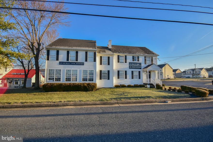 Introducing an exquisite commercial property for sale, ideally situated just off Interstate 81 exit 13 in downtown Martinsburg. This remarkable property spans nearly a half acre, offering a wealth of opportunities for businesses seeking a prestigious and accessible location.

The centerpiece of this property is a magnificent manor home that has been tastefully converted into an elegant office and conference space. The stately architecture exudes charm and sophistication, creating a welcoming and professional atmosphere for employees and clients alike. With its spacious interior, the manor home provides ample room for various office configurations and is equipped with modern amenities.

One of the key highlights of this property is its commitment to accessibility. The conversion of the manor home includes the incorporation of handicap access, ensuring that all individuals can navigate the premises with ease. This thoughtful feature enhances inclusivity and demonstrates a commitment to accommodating the needs of all visitors.

To ensure optimal comfort, the property is equipped with a multi-zone HVAC system. This allows for precise temperature control, creating a pleasant working environment throughout the year. The ability to customize heating and cooling in different zones further enhances energy efficiency and cost-effectiveness.

In addition to the main building, the property offers a substantial storage building, providing ample space for inventory or equipment. Furthermore, there is ample room to expand the parking area or add another building, providing flexibility for future growth and development.

Nestled near downtown Martinsburg, this commercial property enjoys a prime location that combines convenience and visibility. The proximity to Interstate 81 and the downtown area ensures easy access for employees, clients, and customers, fostering increased foot traffic and potential business opportunities.

Whether you are looking to establish a professional office space, host conferences and events, or expand an existing business, this commercial property offers an exceptional opportunity. The combination of the stately manor home, accessible features, multi-zone HVAC, storage building, and potential for expansion make this property a truly remarkable investment.

Don't miss out on the chance to acquire this prestigious and versatile commercial property. Contact us now to arrange a viewing and explore the potential that awaits in this Martinsburg gem.