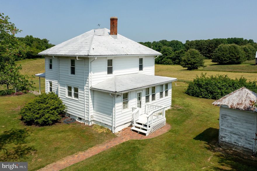 Charm & character best describes this enchanting farmhouse overlooking 47 acres of pasture. Perfect setting for horses. Several barns, outbuilding and sheds including 16'X50' pole shed which is perfect for an RV/Boat storage. Two small streams pass through the property. Home interior offers hardwood floors, country kitchen, enclosed back porch, spacious living room & dining room. Upper level consists of 3 bedrooms and full bath. Lower level is unfinished for additional storage. One of a kind property located in Southern Anne Arundel County with quick access to D.C., AFB, and the Annapolis area.