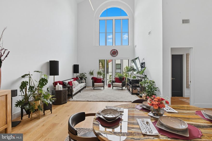 OPEN HOUSE SUN 1-3! This stunning Forest Glen condo combines historic charm, luxe finishes, and unmatched convenience! Industrial chic design welcomes you into a spacious open living and dining area with soaring ceilings, two-story Low-E Windsor windows that flood the space with natural light, and wide-plank white oak flooring with recessed lighting. The chef’s kitchen features a reclaimed wood-faced island, quartz countertops, Grohe fixtures, and high-end appliances. The expansive primary suite includes a custom Elfa walk-in closet and a spa-like ensuite with Porcelanosa tile and floating vanity. Upstairs, the second bedroom offers another full bath with sleek finishes, while the loft provides the perfect office or reading nook under original cathedral wood beams.

This unit also stands out with three dedicated parking spaces—two garage spaces (one equipped with an EV charging port) plus a third space directly in front of the condo. A large private storage room provides even more functionality and value.

Originally built as a luxury resort and later transformed into a women’s college and WWII annex for Walter Reed, the National Park Seminary is a one-of-a-kind historic preservation redevelopment blending modern living with architectural distinction. Community amenities include landscaped gardens, a fitness center, dog park, billiards lounge, and scenic hiking trails that connect directly to Rock Creek Park. All this, just minutes to Forest Glen Metro and I-495. 
Awesome Features: Chef’s kitchen features a reclaimed wood-faced island, quartz countertops, Grohe fixtures, in-counter wine chiller, and other high-end appliances. Expansive primary suite includes a custom Elfa walk-in closet and a spa-like ensuite with Porcelanosa tile and floating vanity. 

Second bedroom boasts a custom Laren Dressing Room and another full bath with sleek finishes
Loft provides the perfect office or reading nook under original cathedral wood beams

Second bedroom boasts a custom Laren Dressing Room and another full bath with sleek finishes

Every bathroom enhanced with Toto Washlets

Doggy Den for pet-friendly living

Custom Elfa closets and pantry for seamless organization
Smart Grid Home featuring:
Level Bolt Smart Lock,
Eero WiFi PoE 6 Access Points,
Emporia VUE Energy Monitor,
ChargePoint Home Flex EV Charger,
Lutron Caséta Smart Lighting with Pico Remotes,
Hunter Douglas PowerView Smart Shades,
Nest Learning Thermostats