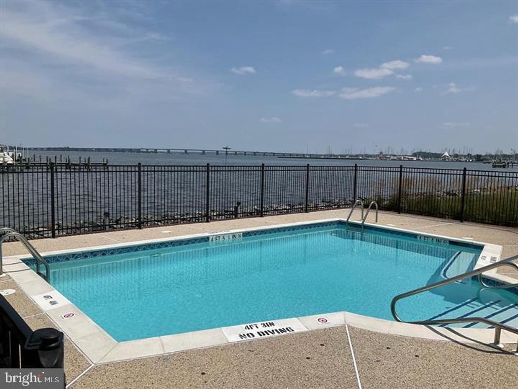 Photo of 5 Oakley Street #102, CAMBRIDGE, MD 21613 (MLS # MDDO2010776)