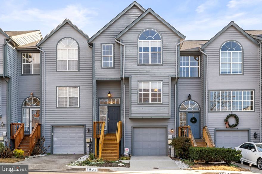 **Offer Deadline- Monday 12/9 at 5pm.** Open house Sunday! Welcome to 1825 Whites Ferry Place, a 3-bedroom, 2.5-bath townhouse in the heart of Crofton, MD.  This beautifully updated home boasts new flooring and fresh paint throughout, new back deck and front steps, and a new roof in 2023.  Move in with peace of mind! The main level of this charming townhouse is a perfect blend of style and functionality. You'll find a bright and inviting formal dining room, ideal for hosting dinner parties or intimate family meals. The space flows effortlessly into the living area, with large windows and a sliding door to the NEW back deck. - a perfect space for grilling or entertaining! The well-appointed kitchen is just steps away, making entertaining a breeze.  Head upstairs to find the primary suite featuring cathedral ceilings, a spacious walk-in closet and a private en suite bathroom. Two additional bedrooms with a shared full bath offer flexibility for family, guests, or a home office. The lower level is fully finished with a large family room with a wood burning fireplace at its center.  This space is flexible and could be used as a home office, play room, or home gym.  The lower level offers convenient access to the back patio and beautifully landscaped yard, additional storage areas, and garage access. Basement closet can be converted to half/full bath. Nestled in a sought-after neighborhood with access to Crofton's top-rated schools, shops, and dining, this home offers the perfect blend of comfort and convenience.  Roof 2023, HVAC 2022, new toilets 2023, new main water line 2022.  Close to Fort Meade, Naval Academy, MARC station, major highways, shops and so much more!  Don’t miss the opportunity to make this gem your own—schedule your showing today!