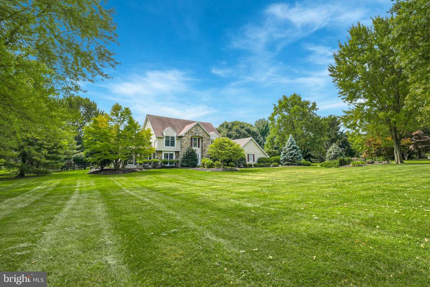 Abundant curb appeal, stylish amenities and a lovely 2021 renovation are the hallmarks of this exceptional home …. combining space, light and imagination. Set on a quiet cul-de-sac, in the stunning environs of Apple Tree Lane developed for Bethlehem Steel’s executives, the property boasts a parklike 3.7 acres. Cortland is a classic example of the much sought after Saucon Valley residence.
Boldly open, yet delivering intimate warmth, the main floor has spacious and inviting rooms. A gorgeous sunroom, with an expansive wall of windows, opens to multiple patios and pool, perfect for alfresco dining. The cathedral-ceilinged living room has a stone, floor to ceiling fireplace. Beautifully executed, the family room opens to an expansive kitchen with wet bar, multiple workspaces and a plethora of cabinets and appliances.
The sophisticated, primary bedroom, has a 2021 light filled, cathedral-ceilinged bonus room. 3 additional bedrooms and bath complete the 2nd floor. A lower level recreation room with bar and a craft room offer a multi-option space. Finally, the 3 car garaging is a family bonus.