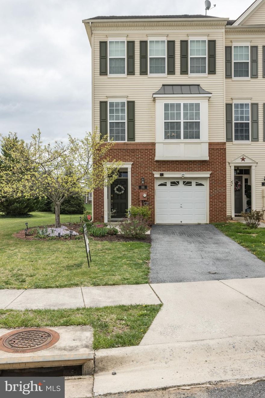 Here's a Toll Bros end unit townhome located in the premier community of Martinsburg Station with amenities such as pool, tennis courts, community club house, parks and walking trails. Conveniently located close to schools, shopping and interstate transit for easy commutes. This gorgeous brick front vinyl siding combo end unit is in move in ready condition and has a one car garage with off street driveway parking as well.  This home boasts 3 finished levels, 9ft ceilings, open floor plan, 2nd floor vaulted ceilings, separate tub/shower / double bowl vanity. Beautiful hardwood flooring on 2 levels, fenced back yard/deck/patio/moldings/Island kitchen w/ bay window.  This townhome has it all!
