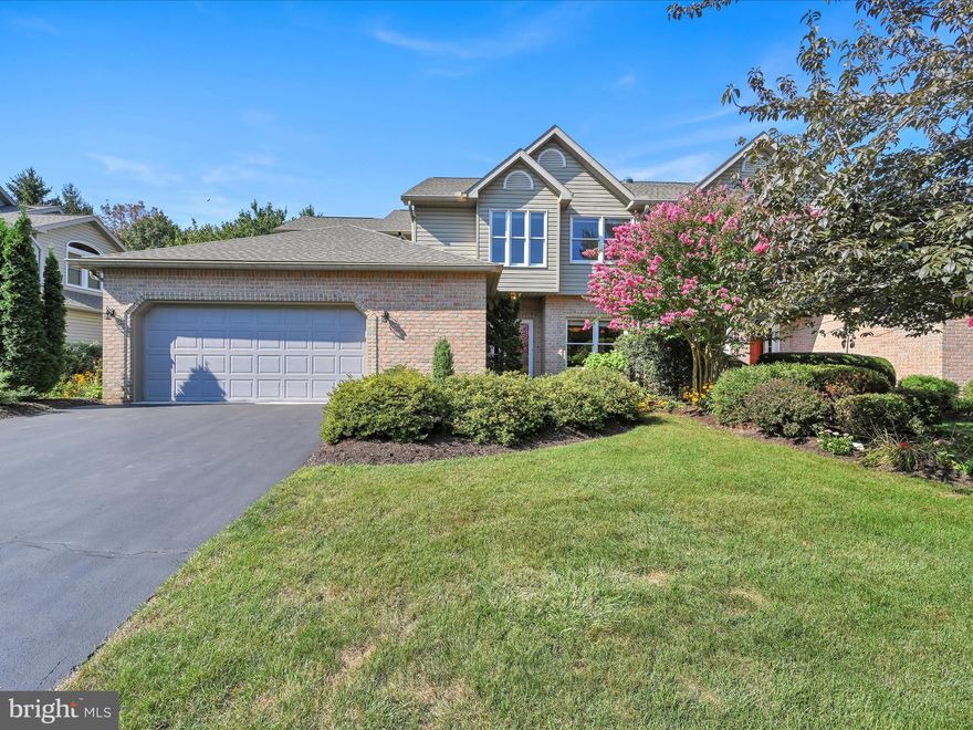 AGENTS please read private remarks. If private, spacious, maintenance free with lots of natural light and located close to everything are all on your 'New Home Must Have' list, this is THE ONE.   This meticulously maintained end unit has plenty of space with no waste.  Recent updates include new roof, new skylights, new freshly painted deck.  Unit has cathedral ceilings, is loaded with recessed lighting, hardwood floors, and walk-in closets.  Kitchen has eating space, solid surface countertops, pantry and upgraded glass cabinet doors.  Lovely Dining Room is spacious enough to comfortably seat guests at your next dinner party.  Living Room has cathedral ceiling, skylights, built-ins, gas see-thru Fireplace, access to deck with retractable awning.  First Floor Primary Bedroom suite has Vaulted Ceiling, see-thru gas Fireplace, terrific natural light, huge walk-in closet, access to deck and Bathroom with-stand up shower and jacuzzi tub.  Laundry is on First Floor. Second floor has 2 Bedrooms, full bath and loft also with natural light (beautiful transom windows above windows) and is perfect for office, tv area, guests or gaming.   Finished exposed lower level has Family Room, full Bathroom, patio and tons of storage.  Front entry 2-car Garage has driveway with ample parking, hose bib and access to area above.  Washer, dryer, fridge remain.  Pool table and ping pong table negotiable.   Recent HVAC servicing receipt available upon request.  Deck will be painted color of siding, prior to settlement.