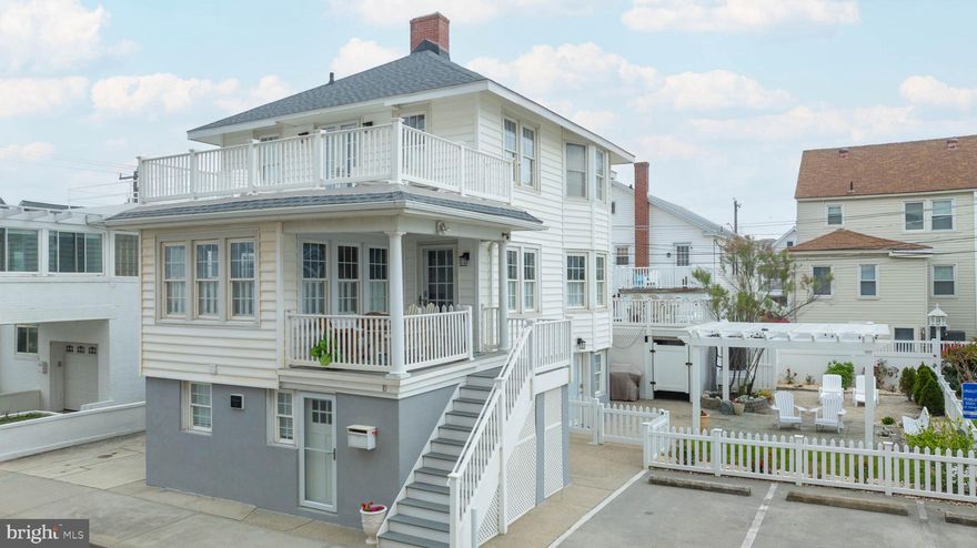 We are proud to offer an exceedingly rare opportunity to own an immaculate five
bedroom, 4.5 bath, three story home which has been lovingly restored to become a perfect blend of “old
Ocean City” but with the cleanliness and aesthetics of a brand new home, even having a super rare side
yard for entertaining and relaxing with the family/friends. Opportunities abound for this 3-properties-in-one house with two street level living quarters, each with one bedroom, full bath, living area, kitchen plus separate entrances located below the main home. The main home above is 3 bedrooms 2.5 baths. Possible uses include maintaining it as a single family home, renting all or some of the three units, or opening a bed and breakfast. Enjoy a 200 foot stroll to the HEART of the OCMD boardwalk, or a couple more steps to the ocean. Parking, which is in short supply in downtown OCMD is not a problem either, with parking for up to FOUR cars in available spots on both side of the house.