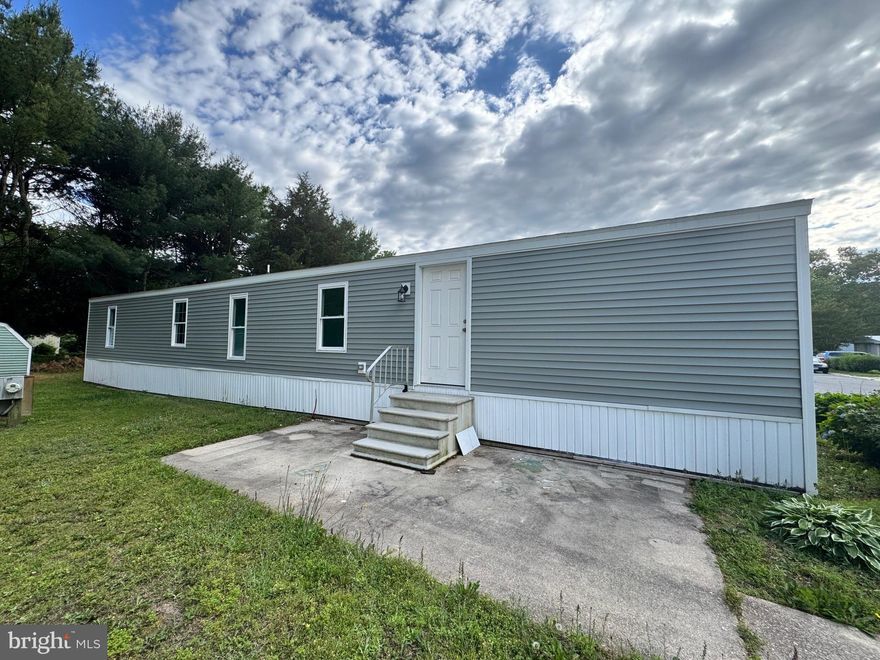 Fully Renovated 3BR/2BA Manufactured Home in Prime Location! Move-in ready, this 3-bedroom, 2 full bath home features an open floor plan with a spacious kitchen, stainless steel appliances, including built-in microwave. Enjoy two beautifully updated bathrooms, large bedrooms, and a hookup for stackable washer/dryer. Ideal as a starter home or vacation retreat. Conveniently located near Salisbury University, shopping, dining, Ocean City beaches, Assateague, and Chincoteague!