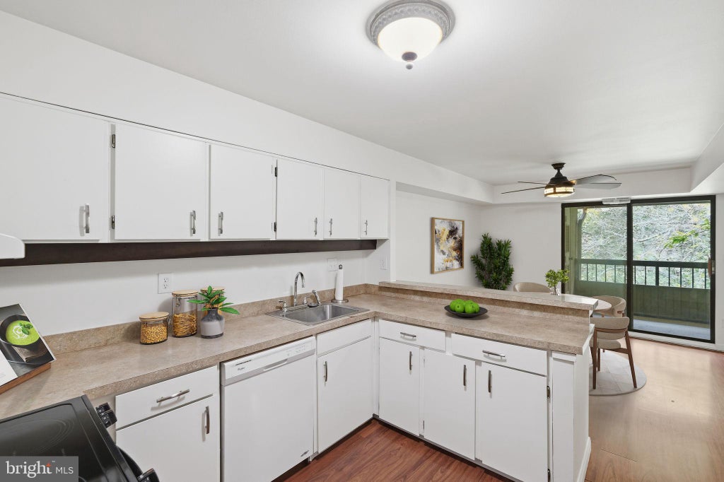 Photo of 5647 Harpers Farm Road #F, COLUMBIA, MD 21044 (MLS # MDHW2072236)