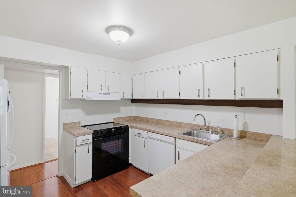 Photo of 5647 Harpers Farm Road #F, COLUMBIA, MD 21044 (MLS # MDHW2072236)