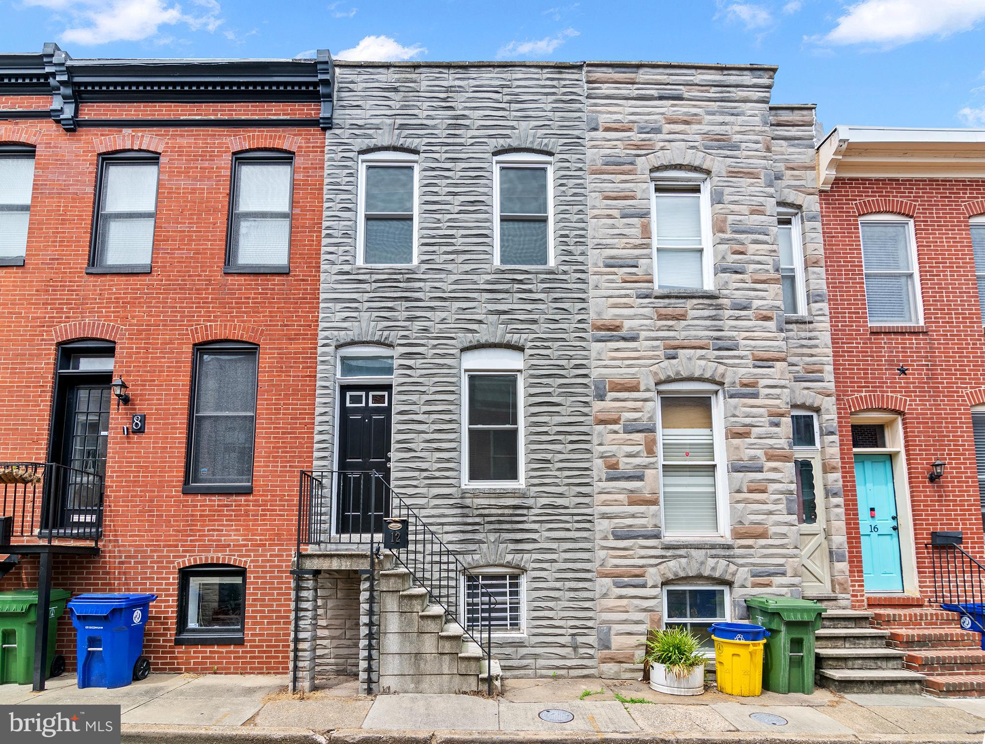 **FHA APPRAISED. CALL LA FOR DETAILS.** Welcome to this classic Baltimore home located in the sought-after Patterson Park neighborhood. Patterson Park, the city's largest green space, offers an array of amenities including open fields, trees, paved trails, lake, playgrounds, sports courts, swimming pool, ice rink, the iconic Pagoda, dog park, and more! This charming three-level home spans 1,332 square feet and features a bright, open living area with a dining room on the main floor, adorned in a neutral color palette. Beneath the carpet, there are hardwood floors that can be uncovered and refinished. The kitchen is equipped with stainless steel appliances, including a gas stove, decorative lighting, wood cabinetry, and ample countertop space, complete with a convenient breakfast bar. Upstairs, you'll find two light-filled bedrooms with ample closet space, a skylight, and a full bathroom with a stylish pedestal sink. The partially finished lower level offers additional living space, a laundry area, and plenty of storage. Outside, a fully fenced patio is perfect for outdoor living and entertaining guests. The patio offers excellent potential for conversion into parking, with the added benefit of a gated alleyway. Updates include AC (8/2024), front load washer and dryer (6 months), water heater (2021), vinyl windows (3 yrs), stainless appliances (3 yrs), front door (3 yrs), roof (5 yrs), patio and fence (5 yrs) and electric (approx 12 years). Conveniently located near a variety of restaurants, shopping destinations, scenic waterfront park and promenade, downtown attractions, stadiums, Johns Hopkins University (JHU), Bayview, Canton, Fells Point, and major commuter routes such as I-95, I-895, and I-83/Jones Falls Expressway.