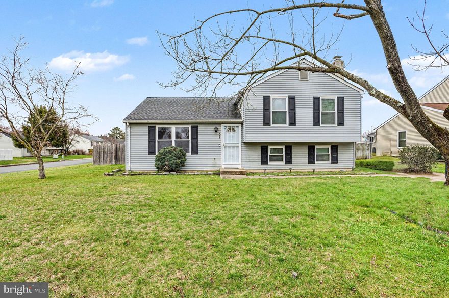 This delightful split-level home offers a perfect blend of comfort and functionality. With 1,600 square feet of thoughtfully designed living space, this residence features three spacious bedrooms and two and a half bathrooms with new flooring throughout. Step inside to discover a warm and inviting atmosphere, highlighted by a cozy fireplace that serves as the heart of the living area. The fully finished basement provides additional space for recreation or a home office.  The kitchen is equipped with modern appliances including an electric oven/range, microwave, dishwasher, and refrigerator, all designed to make meal preparation a breeze. Enjoy the outdoors on the charming patio, ideal for morning coffee or evening relaxation. The property also includes a shed for additional storage needs. With a generous 0.21-acre lot and driveway parking, there's plenty of space for outdoor activities. This home combines comfort, style, and practicality, making it a wonderful place to create lasting memories. Don't miss the opportunity to make this inviting space your own!