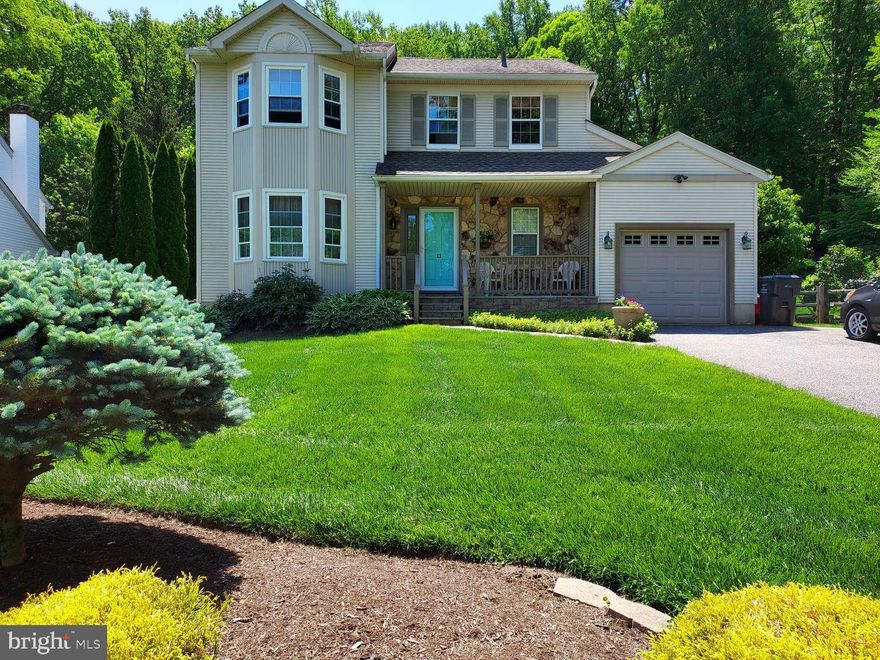 11 Canterbury Drive, Kennett Square, PA 19348
Don’t miss this incredible opportunity to own a single-family home in the desirable Longwood Crossing community. This updated open concept and meticulously maintained home is totally move-in ready. Situated on a large private lot, with post & 3-rail fencing, the grass and landscaped backyard is privacy protected by wooded surroundings. With a large brick patio and deck, the rear yard is perfect for entertaining and fenced for pets. The front covered porch entrance welcomes you into the foyer. The open design allows for views of the combination living and dining rooms through to the kitchen and family room out to the backyard. There is plenty of natural light through the new vinyl windows and skylights. The completely updated classic black/white kitchen delivers everything the home chef could ask for including recessed lighting, updated black appliances, beautiful white cabinetry, black granite countertops, stylish tile backsplash and a peninsula with ample space for preparing and serving meals. Additional glass door cabinetry line the eat-in portion of the kitchen. The family room is a step down from the kitchen and opens onto the deck. The family room features a tiled floor, vaulted ceiling, sky lights and a gas fireplace. The 2nd floor includes 3 bedrooms and 2 full baths. The primary bedroom has a large front window with window seat & storage. The ensuite master bath is fully updated featuring tile and a walk-in glass shower. Perfect for home office, play area and movie watching the finished basement includes recessed lighting, heat, concrete floor and separate, unfinished large storage area with shelving and the laundry. There is an attached 1-car garage with plenty of storage space for your garden and carpentry tools. This desirable and convenient location to the historic Brandywine Valley, Longwood Gardens, museums, outdoor hiking, kayaking, and numerous parks are just minutes away. The Longwood Crossing community is close to everything Kennett Square has to offer including quaint shoppes, several highly ranked restaurants and tap houses and the world-renowned mushroom festival. There is easy access to Wilmington, West Chester, train transportation, and Routes 52, Rt. 1, 322 and 1-95. Homes like this don’t become available very often. This home offers so much value and immediate entertaining and living opportunity. Make your appointment today!