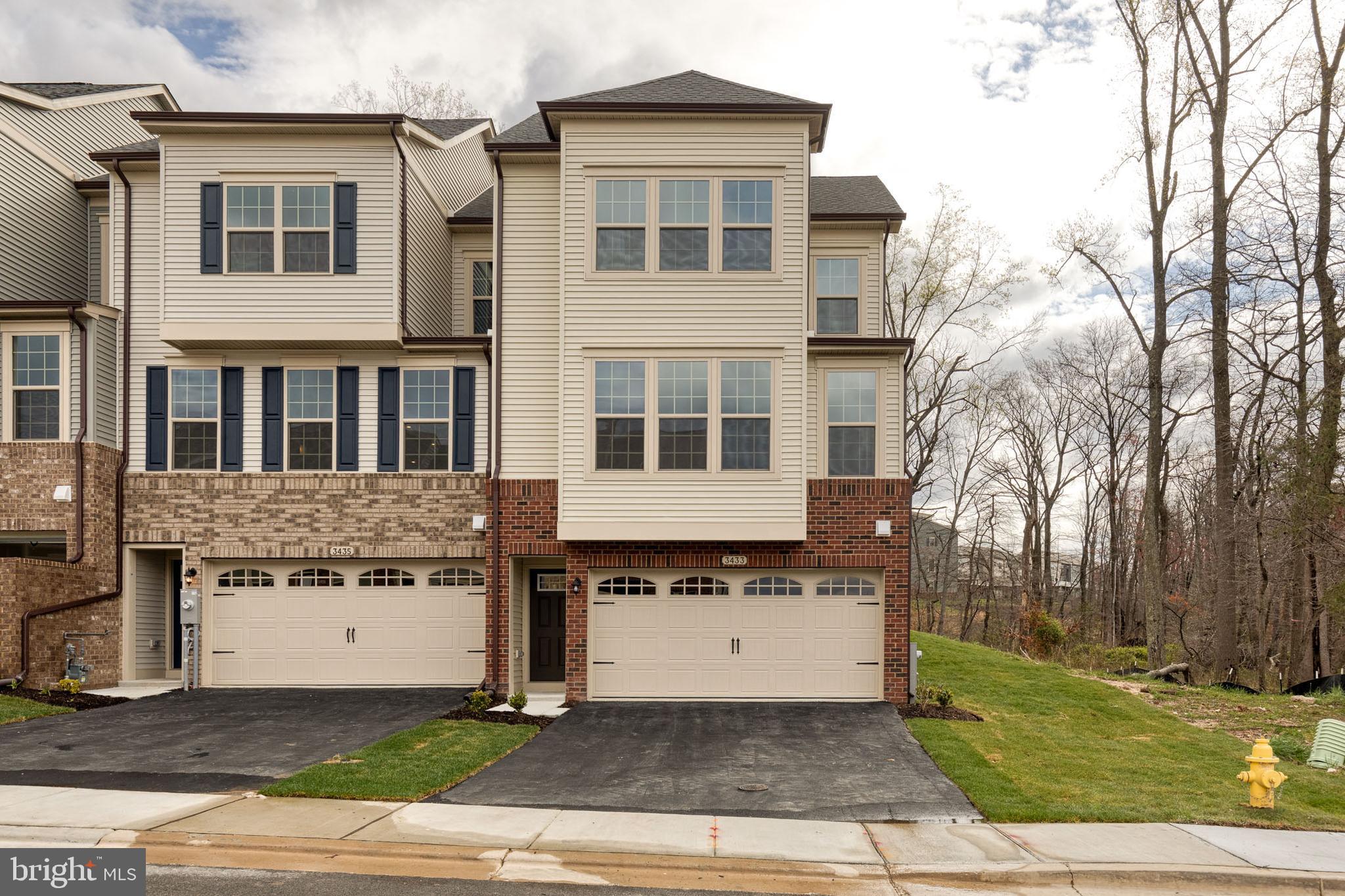This Designer-Inspired Urban Townhome offers every modern convenience with the best of locations to enjoy a modern lifestyle for your professional and personal enjoyment. Almost New End of Row Home features 2-car garage with EV Charging station, Four Bedrooms, Covered Deck, Gourmet kitchen with expansive island and a light-filled open layout that connects the living, dining, and entertaining spaces. This convenient and flexible layout makes multigenerational living a breeze with separate living spaces: 1 bedroom and full bathroom on the lower level can function as a separate "apartment." Fully wired for Speedy Data and your Smart Home needs. Love the Outdoors? Enjoy this private location, with green/forest space at the back and side of your property. Convenient end of row location also allows for extra street parking for your guests. Hop over to the playground just across the street and a beautiful pool and fitness center just a short walk away. Shopping and dining nearby is plentiful with groceries and restaurants only 1 mile from your front door. Traveling by air comes easy with BWI Airport just 15 minutes away, and to top it all off, your speedy access to commuter routes I-295, I-95, I-32 and I-97 will have you in Columbia, Baltimore, Annapolis or DC in no time at all! Subject to Existing Lease which ends June 2026.
