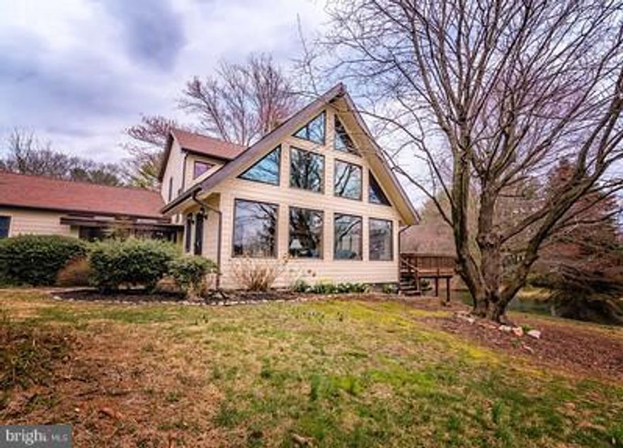 Fine Country Living minutes to Newark, DE!!  2.6 Acres, 4 BR, 3 Full Baths, Fin Basement, Dramatic 2 Story Great Room w/Stone Fireplace, Terrific Loft, 1st Floor Master BR, Spacious Country Kitchen, Family Room, Detached 2 Car Garage, Screened in Porch, Above Ground Swimming Pool and a Pond. Newer Siding, Roof and Hot Air Furnace. Got Horses? Right near Fair Hill, Can board horses across street.