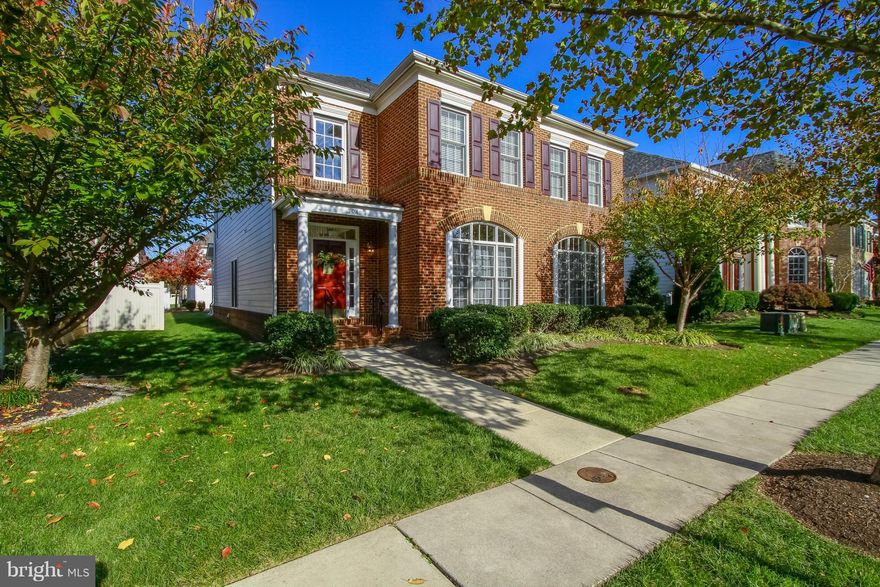 Beautiful 5BD/5BA home w/private stone patio, 2-car garage & steps from community pool & open space. Inside boasts wood floors, crown molding & tasteful trim through the main level. Soaring 18' family room ceiling, gas fireplace & open kitchen w/ double ovens & gas range. Huge master suite with his/her walk-in closets. Full finished basement w/wet bar & room for a home theater.