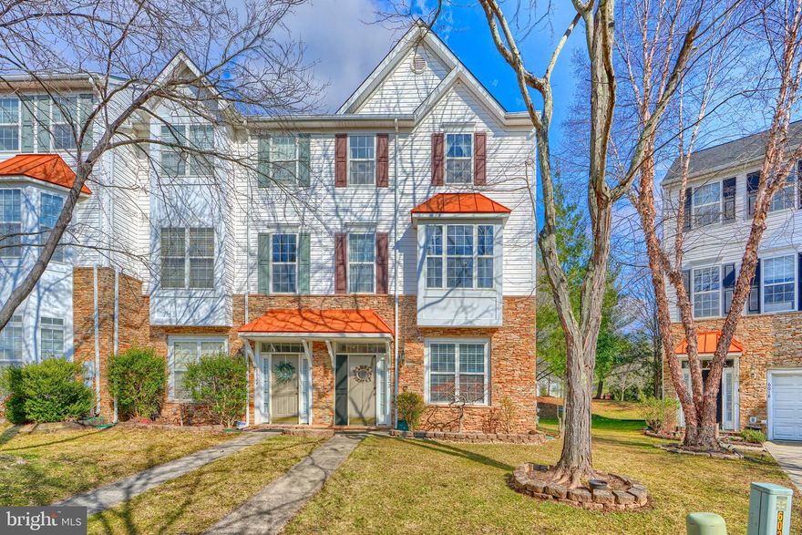 Welcome  to this spacious end unit townhome in River Hill community. The house is filled with natural light through large windows from 3 sides of the house . Nine foot ceiling throughout. Vaulted ceiling in upper level with sky light. Gleaming hardwood floors throughout the main and the upper level.  Master bed room suite includes twin walk-in closets, a bathroom with a jacuzzi bath tub, a separate shower and  double sinks vanity.  There is an additional full bathroom on upper level, and one on the lower family room level.  The main level has a gas fire place, a large kitchen and living and dining room. Additional bedroom and a full bath in the lower level for guest or in-lows suite. The location is perfect! Just minutes away from major highways for easy commute . The expanding Clarksville Community shops and restaurants are walking distance.  Community is surrounded by paved trails that meander throughout River Hill, leading to the outdoor community pool & several playgrounds.