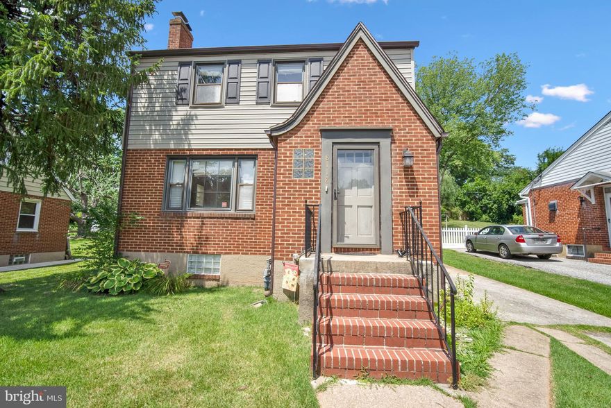 Beautiful Move in Ready home in Rosedale!  3 Bedroom, 1 1/2 bath Colonial with  charming original arches, hardwood floors, crown molding and wood burning fireplace.  This home has been updated throughout, to include kitchen, appliances, bathrooms.  Large lower level family room perfect for entertaining, with half bath that can easily be converted to full bath.  Level rear yard is a blank slate.  Make your appointment before it's gone!