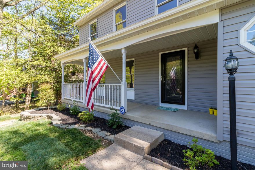 Spacious Colonial, Bright & Airy, Features Include Beautiful Hardwoods, 4 Bedrooms, 2.5 Baths, Family Room w/Fireplace, Huge Rear Deck Ideal For Entertaining, Front Porch, Great Location Close to Quantico, Schools, Restaurants, Loads Community Amenities!