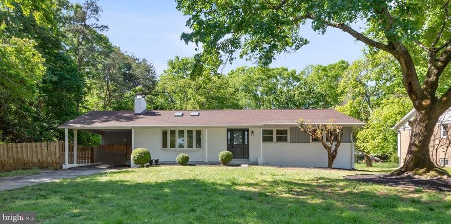 MASSIVE PRICE DROP! Welcome to your dream home! This stunning property boasts 5 spacious bedrooms and 3 modern bathrooms, and it is completely turn-key ready for you to move in and start enjoying immediately. The beautifully renovated kitchen is equipped with sleek stainless steel appliances, perfect for cooking and entertaining guests. The basement features a cozy fireplace, providing the perfect atmosphere to relax and unwind. Step outside to the large deck where you can entertain guests, barbeque or simply relax under the warm sun. The home is surrounded by mature trees, offering privacy and natural beauty. The entire home has been updated with gorgeous hardwood flooring, which provides warmth and style to the interior. You will love coming home to this charming and inviting property that has everything you could want in a home. Don't miss out on the opportunity to make this property yours today!