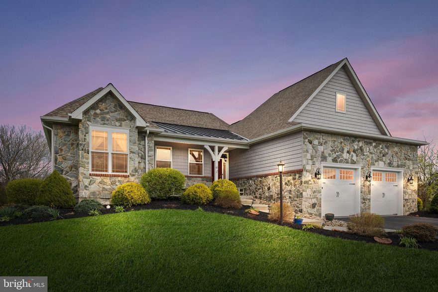 Welcome to 60 Cooper Lane – where luxury, privacy, and energy efficiency come together in perfect harmony. Nestled on a quiet cul-de-sac in Cumberland Crossing at The Links at Gettysburg, this stunning single-family home offers 4 bedrooms, an executive office (or optional 5th bedroom), and 3 full baths across approximately 3,932 square feet of beautifully designed living space.

What truly sets this property apart is the premium .60-acre lot, for which the current owners paid a premium—and for good reason. This home enjoys a Limited Common Facility, and the common limited facility is truly exclusive to this home, creating a private, expansive yard that no other property in the community can access. It’s your own private wooded retreat—ideal for outdoor living, entertaining, or simply unwinding in peace.

Built with performance and sustainability in mind, this high-efficiency home meets EPA Indoor airPLUS standards, preventing pollutants from entering the living space. Notable features include 6.1 kW capacity owned solar shingles, a heat pump water heater, and a whole-house generator—all designed to keep energy costs low while maximizing comfort.

The interior stuns with true 4” hardwood floors throughout most of the main level, an open-concept floor plan, and a gourmet kitchen complete with custom Shady Grove cabinetry, quartz countertops, a massive 9’ x 4’ island, and a walk-in pantry. Stainless steel appliances, including a 36” induction cooktop, round out this chef’s dream.

The main-level primary suite includes a luxurious bath with custom tilework, double vanity, and a large walk-in shower. Additional bedrooms, including one designed flexibly as an office or bedroom, and a lower level with two more bedrooms, a large family room, full bath, and hobby/exercise room ensure space for everyone. There are also two storm-shelter ready rooms for peace of mind.

Step out through double doors to your private patio—a front-row seat to nature and tranquility that’s unmatched in the neighborhood.

The HOA handles lawn maintenance, snow removal, trash, and recycling, making low-maintenance living a breeze. Residents enjoy access to resort-style amenities: a renowned 18-hole golf course, community clubhouse, dining, pro shop, swimming pool, pickleball and tennis courts, basketball, playgrounds, and miles of scenic walking trails.

Don’t miss this rare opportunity to own one of the most exclusive lots in the community—a perfect blend of luxury, privacy, and thoughtful design in one of Gettysburg’s most desirable neighborhoods.