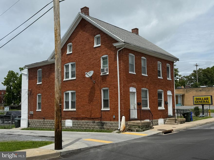 Fantastic Value-Add Investment Opportunity – Prime Location in Hagerstown! This all-brick duplex, ideally located just off Dual Highway, offers a rare chance to own a solid, income-producing property with huge upside potential. Unit 51 features a welcoming living room with hardwood floors, a cozy kitchen, and a dining area perfect for gathering. Upstairs, you’ll find three carpeted bedrooms with ample closet space and a full bath. The basement offers laundry hookups and extra storage. Unit 53 boasts hardwood floors throughout the living room, kitchen, and dining area, with three spacious bedrooms upstairs featuring hardwood floors, generous closets, and a full tiled bath. The basement includes laundry facilities, and the fenced backyard provides outdoor space and privacy.
