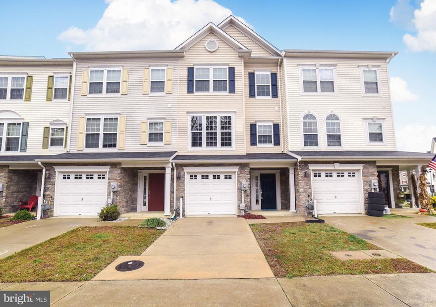 Move in Ready 3 full finished levels! Hardwood floors on mainl level, 3 bedrooms, 2 full and 2 half baths.  1 car finished garage. Separate living and family room. Fenced in back yard.