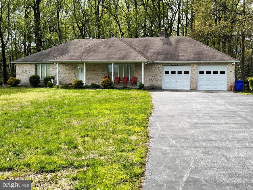 Well maintained All Brick Rambler on 3 acres