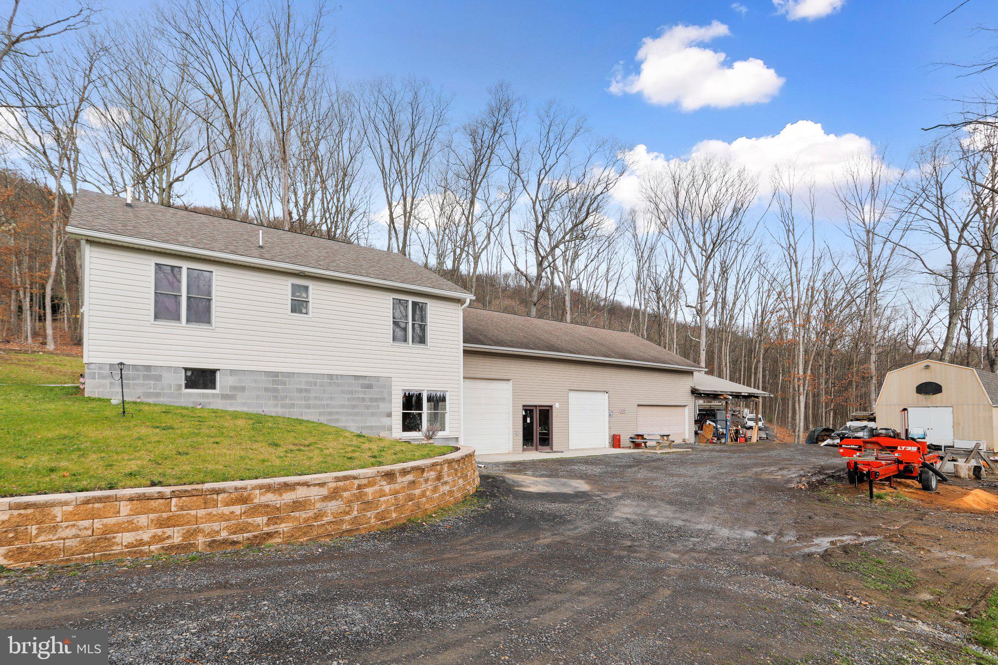 Prepare to be impressed! Nestled in the picturesque area of Ridgeley, WV, awaits a property that embodies the height of modern comfort and convenience. This meticulously crafted home boasts a desirable 2 bedroom, 2 full bathroom configuration, providing the perfect retreat for those seeking a comfortable and efficient haven. Step inside to discover 1,024 square feet of thoughtfully designed living space, offering both functionality and style. With a full unfinished basement, the potential for customization and expansion is limitless, allowing you to tailor this space to suit your unique lifestyle and needs. Situated on a sprawling 2.90-acre lot comprised of three individual parcels, this property offers ample space for outdoor activities and relaxation amidst nature's tranquility. But that's not all – the true highlight of this estate lies in its impressive amenities. Prepare to be awed by the colossal 1,920 square feet heated 4-car garage, complete with an additional storage area. Whether you're a car enthusiast or simply require ample space for your vehicles and recreational equipment, this garage is sure to exceed your expectations. Need even more parking options? Fear not, as a convenient 864 square feet 2-car carport awaits to accommodate your vehicles with ease. But the perks don't end there. For those with a busy lifestyle, the property's prime commuter location is a major advantage. Whether you're heading to Cumberland MD, ATK, IBM, or beyond, easy access to major thoroughfares ensures a hassle-free journey to your destination. Don't let this opportunity slip through your fingers. Seize the chance to own a property that combines the garage space you have always dreamed of coupled with flawless functionality, and convenience.